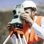 group-smiling-builders-hardhats-construction-site